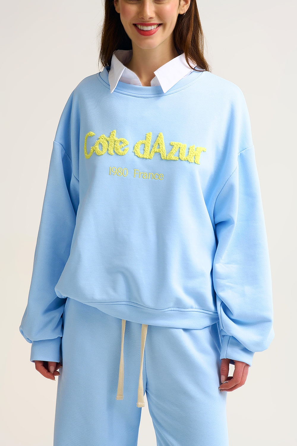 Sweatshirt azul pastel bordada Côte d'Azur