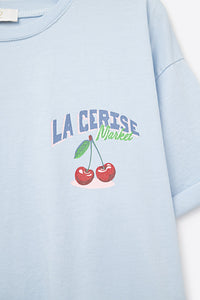 T-shirt azul com grafismo La Cerise Market Saint-Tropez