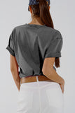 T-shirt cinzenta com gola redonda e texto Belleville