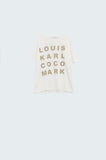 T-shirt Creme com logótipos de nomes famosos à frente