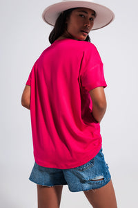 T shirt Fuchsia com texto Good Vibes