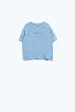 T-shirt Sunshine Oversized com texto texturado à frente em azul
