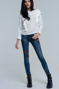 Top com detalhe de ruffle em creme