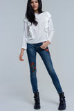Top com detalhe de ruffle em creme