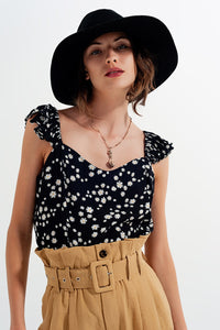 Top com tiras finas com rufos e estampas florais preto