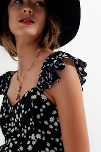 Top com tiras finas com rufos e estampas florais preto