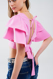 Top cor-de-rosa com mangas curtas e decote em V