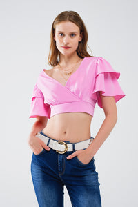 Top cor-de-rosa com mangas curtas e decote em V