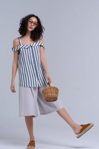 Top creme com listras azul