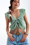 Q2 Top curto em ruffled verde com mangas volumosas atadas à frente