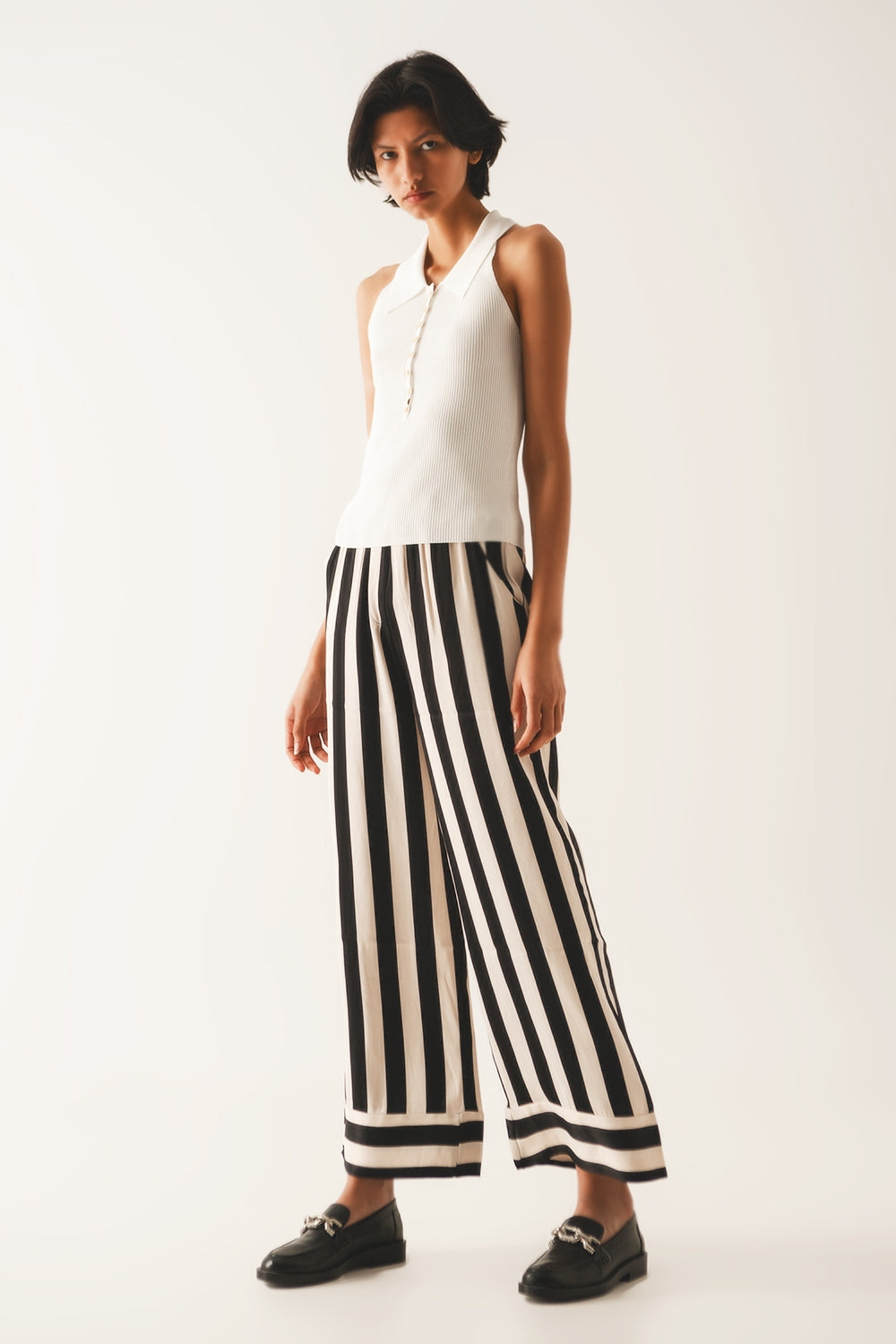 Top de malha com pescoço de polo em creme