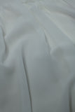 Top de musselina branca com design de pregas