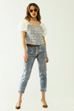 Top de tweed azul com mangas curtas volumosas e botões de pérolas