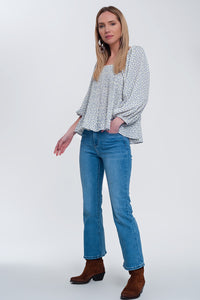Top floral azul com decote quadrado e mangas insufláveis