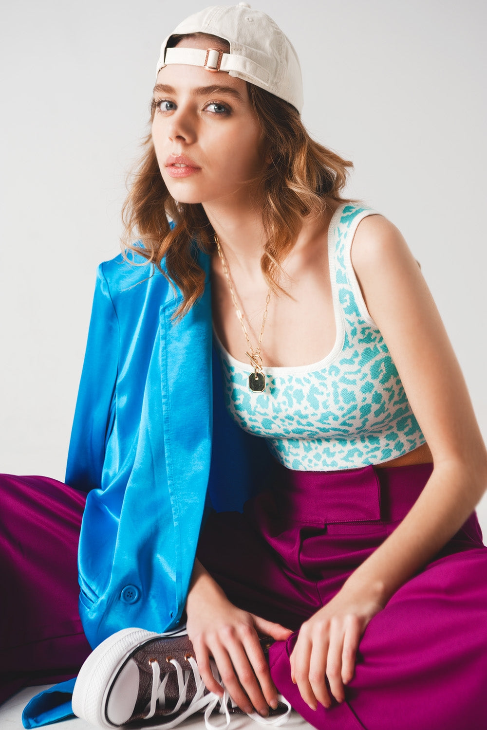 Q2 Top malha leve em impressão animal turquesa