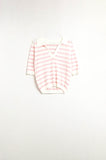 Top polo branco de malha com riscas cor-de-rosa