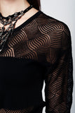 Top pontilhado preto com detalhes rendas