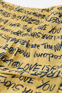 Top sem alças elástico amarelo com letras pretas