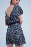 Vestido cor azul marinho dia floral com abertura nas costas