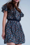 Vestido cor azul marinho dia floral com abertura nas costas
