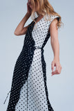 Vestido cross midi negro com estampa de bolinhas