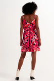 Vestido curto cor-de-rosa vivo com estampado de flores e alças