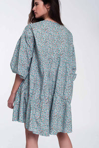 Vestido curto de babydoll com mangas bufantes e bainha com desenho floral