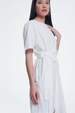 Vestido de camiseta creme com frente colada