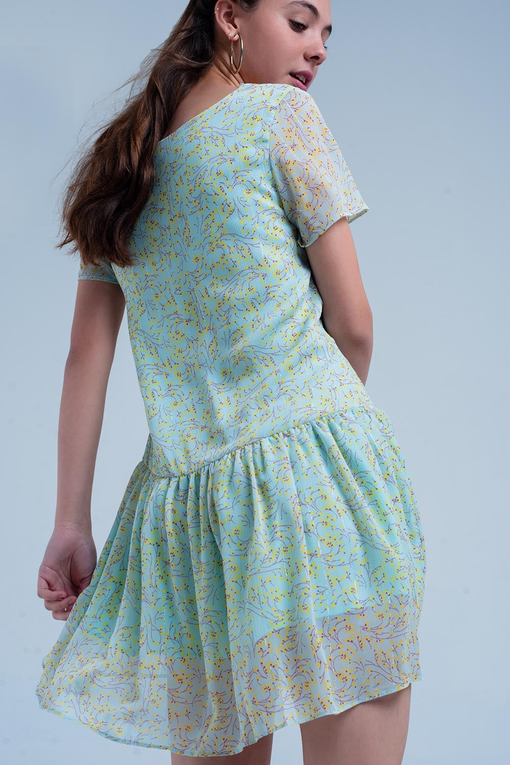 Vestido estampado verde com saia plissada