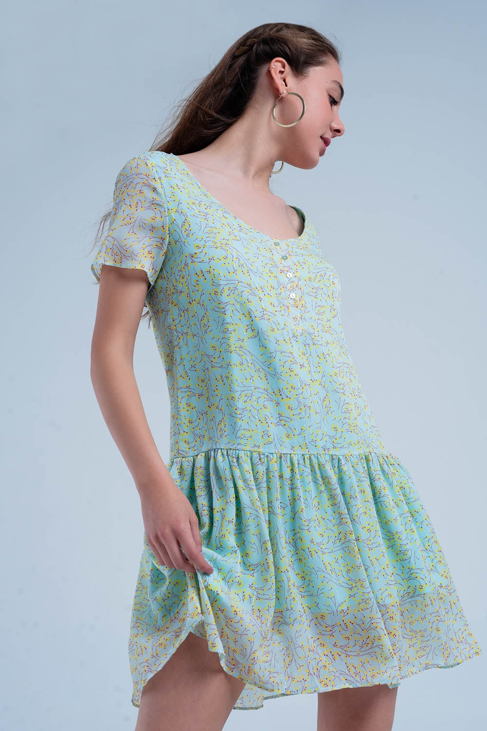 Vestido estampado verde com saia plissada