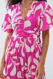 Vestido maxi com estampado floral fúcsia e costas abertas
