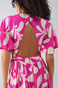 Vestido maxi com estampado floral fúcsia e costas abertas