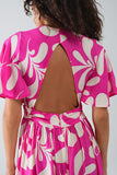 Vestido maxi com estampado floral fúcsia e costas abertas