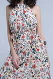Vestido midi floral bege com gola alta e aberturas
