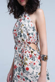Vestido midi floral bege com gola alta e aberturas