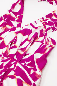 Vestido Midi Halter com cintura subida em estampado abstrato fuchsia e branco