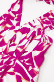 Vestido Midi Halter com cintura subida em estampado abstrato fuchsia e branco
