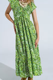 Vestido midi romântico com mangas curtas e folhos em estampado de folhas verdes