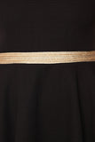 Vestido skater en tejido texturizado negro con detalle de cinturon