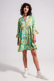 Vestido verde com corte largo e mangas de três quartos de comprimento